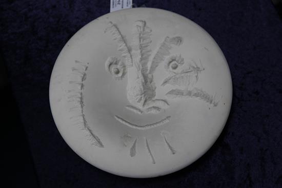 Pablo Picasso. A Madoura biscuit pottery Visage en gros relief dish, c.1963, 27cm